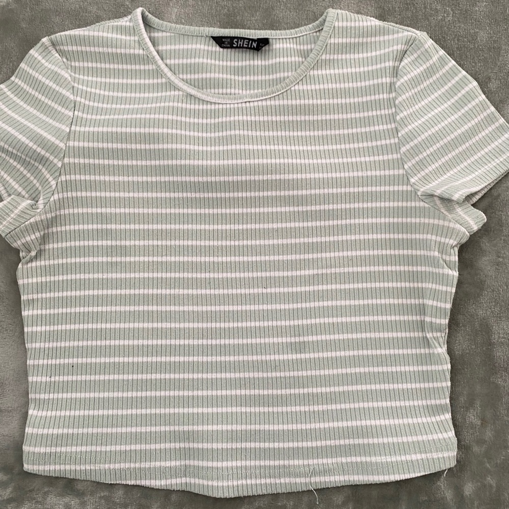mint green and white striped shirt
